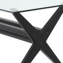 A dining table with black base and a  glass top from Eichholtz.