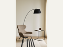  lamp features a sleek steel frame with a graceful curved silhouette black finish