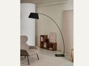  lamp features a sleek steel frame with a graceful curved silhouette black finish