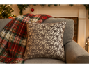 floral print velvet cushion on a sofa