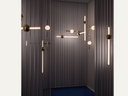 Globe Light Suspension combining polished gold and gunmetal spheres with matching opaque and solid tubes